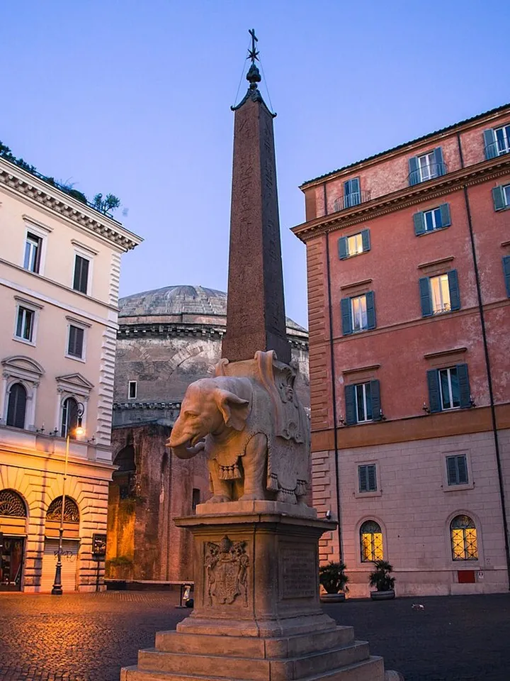 Bernini's marble elephant carrying an obelisk in Piazza della Minerva, the Pantheon behind